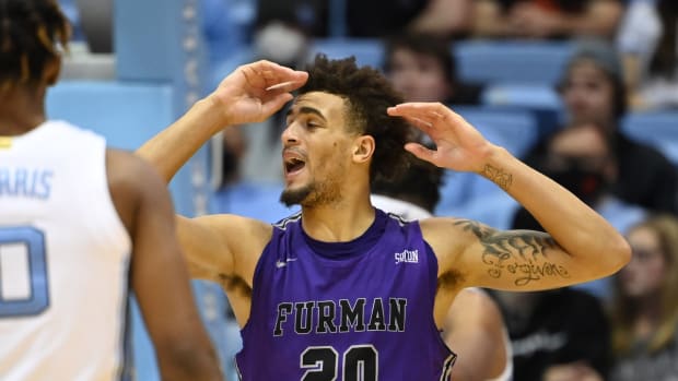 Dec 14, 2021; Chapel Hill, North Carolina, USA; Furman Paladins forward Jalen Slawson (20) reacts in the second half at Dean E. Smith Center. Mandatory Credit: Bob Donnan-USA TODAY Sports